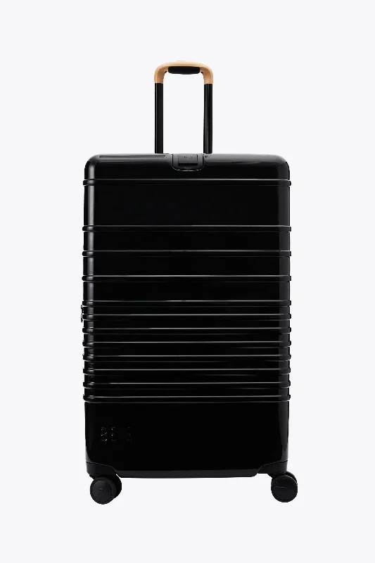 The Large Check-In Roller in Glossy Black